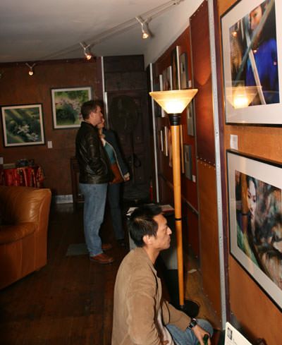Many attendees took time to really study the various Asian art on display.
